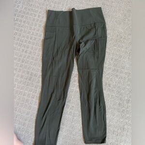 Athleta salutation stash 7/8 tight dark green size large